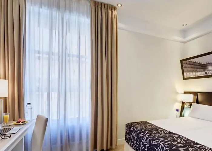 Sercotel Torres Отель