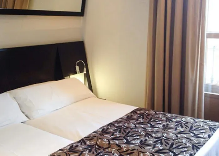 Sercotel Torres Отель